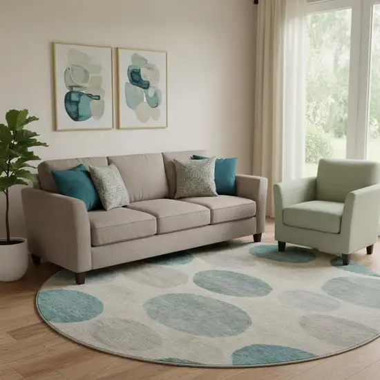 8' Teal And Ivory Geometric Washable Round Rug With UV Protection Photo 2