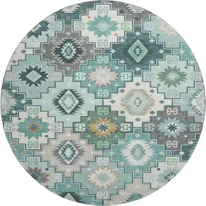 Photo of 8' Teal And Ivory Geometric Washable Round Rug With UV Protection