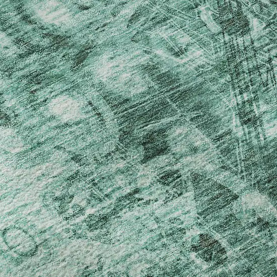 8' Teal And Ivory Ikat Washable Round Rug With UV Protection Photo 9