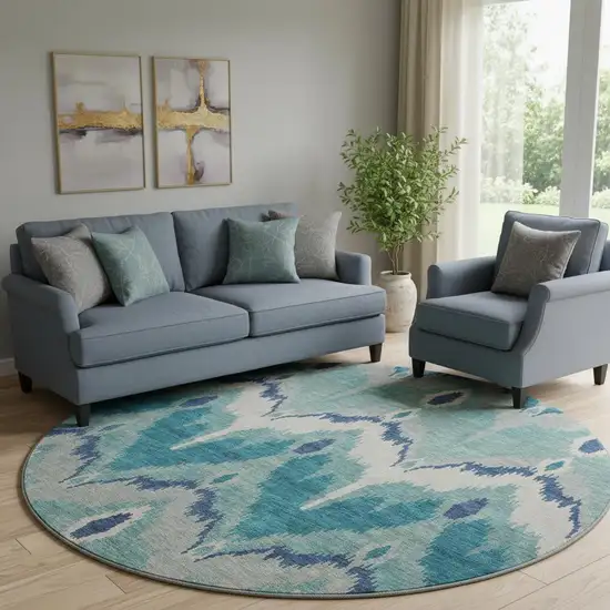 8' Teal And Ivory Ikat Washable Round Rug With UV Protection Photo 1