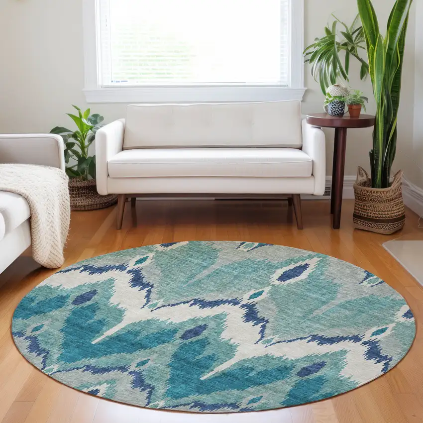 8' Teal And Ivory Ikat Washable Round Rug With UV Protection Photo 5