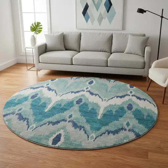 8' Teal And Ivory Ikat Washable Round Rug With UV Protection Photo 2