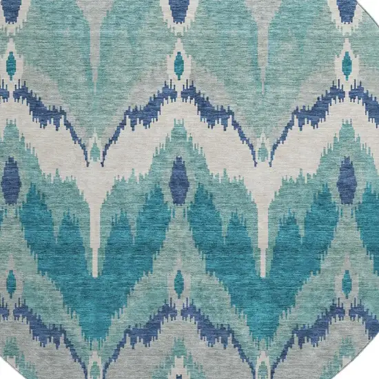 8' Teal And Ivory Ikat Washable Round Rug With UV Protection Photo 3