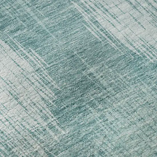 8' Teal And Ivory Ikat Washable Round Rug With UV Protection Photo 9