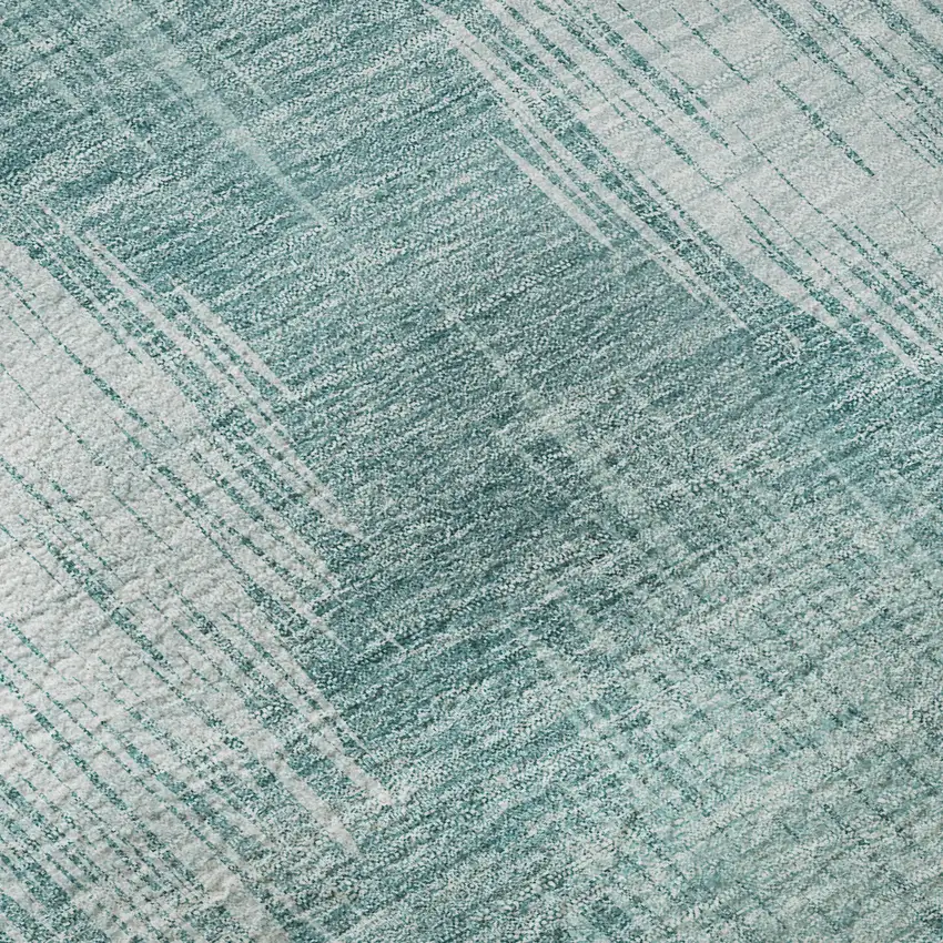 8' Teal And Ivory Ikat Washable Round Rug With UV Protection Photo 9