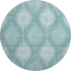 Photo of 8' Teal And Ivory Ikat Washable Round Rug With UV Protection