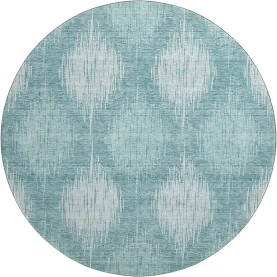 8' Teal And Ivory Ikat Washable Round Rug With UV Protection Photo 1