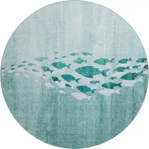 Photo of 8' Teal And Ivory Nautical Washable Round Rug With UV Protection