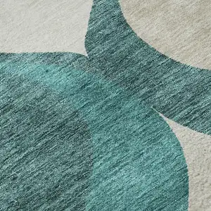 Photo of 8' Teal And Ivory Ogee Washable Round Rug With UV Protection