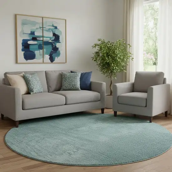 8' Teal And Ivory Ombre Washable Round Rug With UV Protection Photo 1