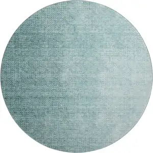 Photo of 8' Teal And Ivory Ombre Washable Round Rug With UV Protection