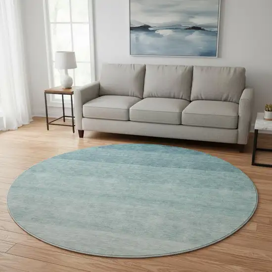 8' Teal And Ivory Ombre Washable Round Rug With UV Protection Photo 2
