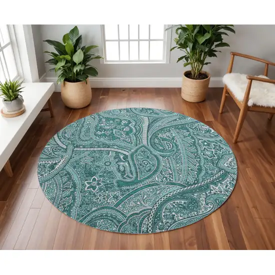 8' Teal And Ivory Paisley Washable Round Rug With UV Protection Photo 2
