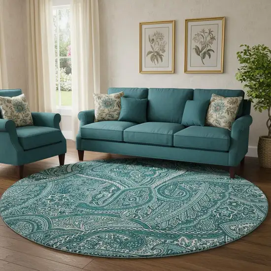 8' Teal And Ivory Paisley Washable Round Rug With UV Protection Photo 1