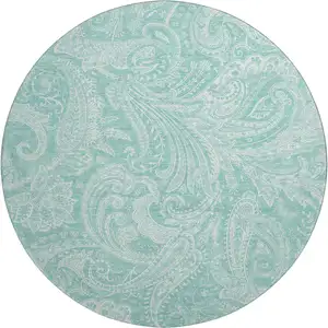 Photo of 8' Teal And Ivory Paisley Washable Round Rug With UV Protection