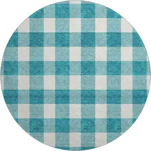 Photo of 8' Teal And Ivory Plaid Washable Round Rug With UV Protection