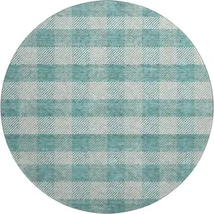 Photo of 8' Teal And Ivory Plaid Washable Round Rug With UV Protection