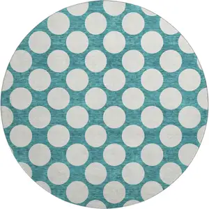 Photo of 8' Teal And Ivory Polka Dot Washable Round Rug With UV Protection