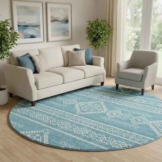 8' Teal And Ivory Southwestern Washable Round Rug With UV Protection Photo 1