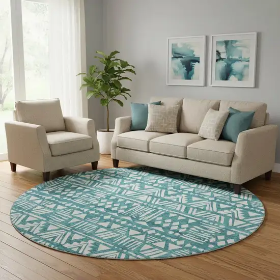 8' Teal And Ivory Southwestern Washable Round Rug With UV Protection Photo 1