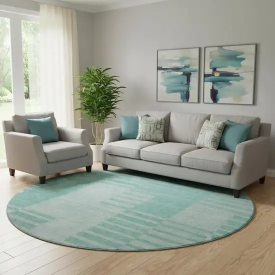 8' Teal And Ivory Striped Washable Round Rug With UV Protection Photo 1