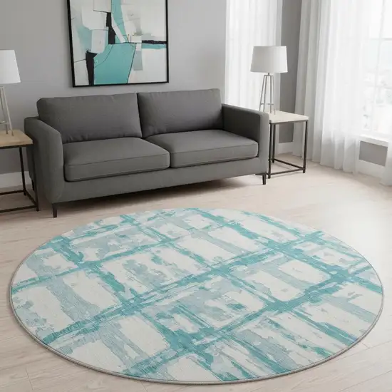 8' Teal And Ivory Striped Washable Round Rug With UV Protection Photo 2