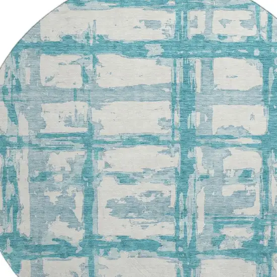 8' Teal And Ivory Striped Washable Round Rug With UV Protection Photo 3