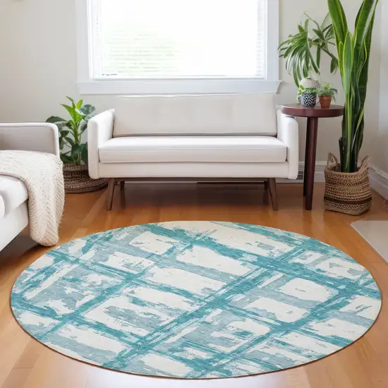 8' Teal And Ivory Striped Washable Round Rug With UV Protection Photo 5