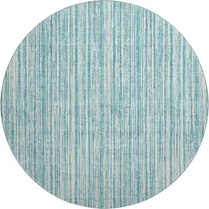 Photo of 8' Teal And Ivory Striped Washable Round Rug With UV Protection