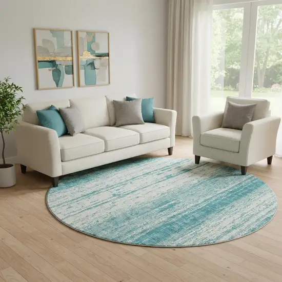 8' Teal And Ivory Striped Washable Round Rug With UV Protection Photo 1
