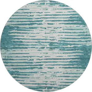 Photo of 8' Teal And Ivory Striped Washable Round Rug With UV Protection