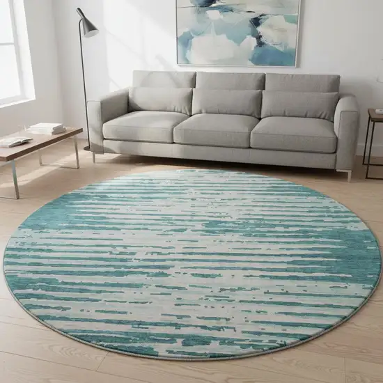 8' Teal And Ivory Striped Washable Round Rug With UV Protection Photo 2