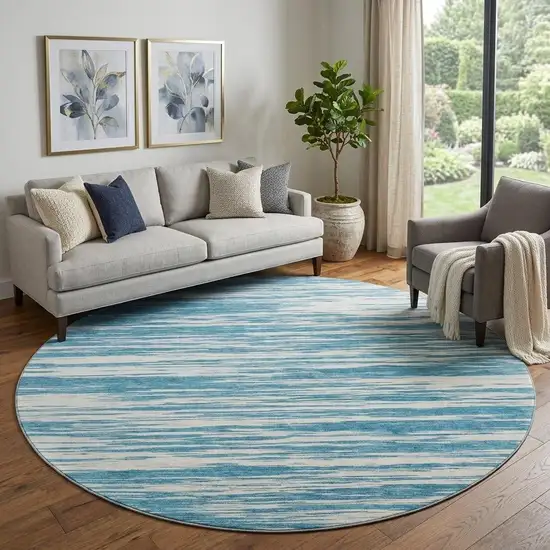 8' Teal And Ivory Striped Washable Round Rug With UV Protection Photo 1