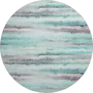 Photo of 8' Teal And Ivory Striped Washable Round Rug With UV Protection