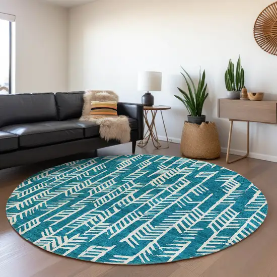 8' Teal And Ivory Tribal Washable Round Rug With UV Protection Photo 5