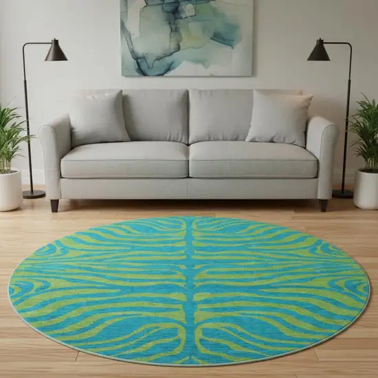 8' Teal And Lime Green Animal Print Washable Round Rug With UV Protection Photo 2