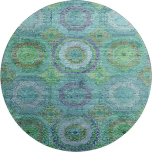 Photo of 8' Teal And Lime Green Geometric Washable Round Rug With UV Protection