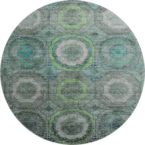 Photo of 8' Teal And Lime Green Geometric Washable Round Rug With UV Protection
