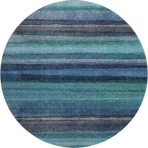 Photo of 8' Teal And Navy Blue Striped Washable Round Rug With UV Protection