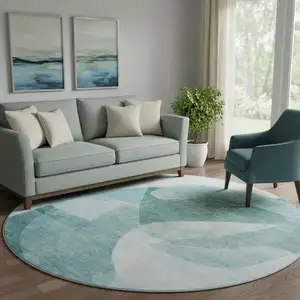 Photo of 8' Teal And Pale Aqua Abstract Washable Round Rug With UV Protection