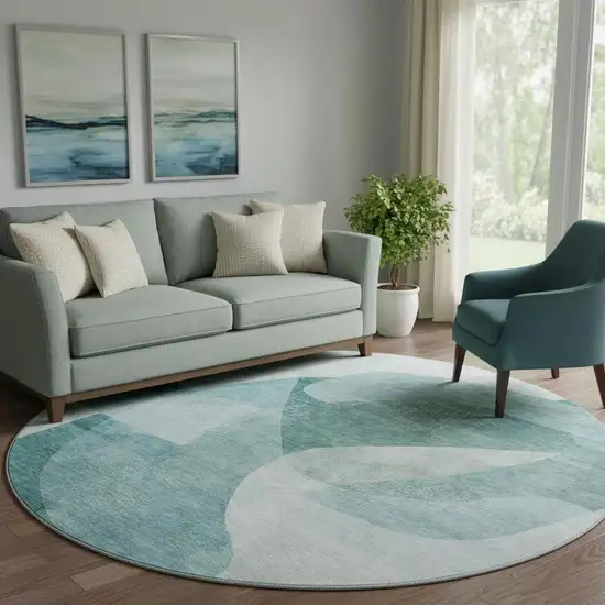 8' Teal And Pale Aqua Abstract Washable Round Rug With UV Protection Photo 2
