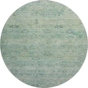 Photo of 8' Teal And Pale Aqua Abstract Washable Round Rug With UV Protection