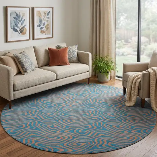 8' Teal And Peach Abstract Washable Round Rug With UV Protection Photo 1