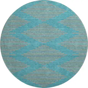 Photo of 8' Teal And Peach Geometric Washable Round Rug With UV Protection
