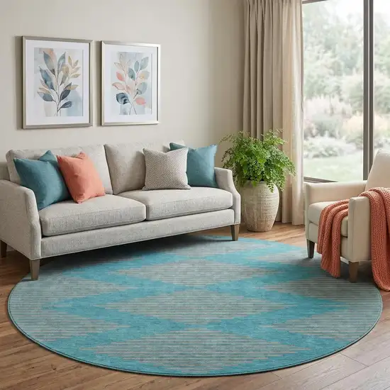 8' Teal And Peach Geometric Washable Round Rug With UV Protection Photo 1