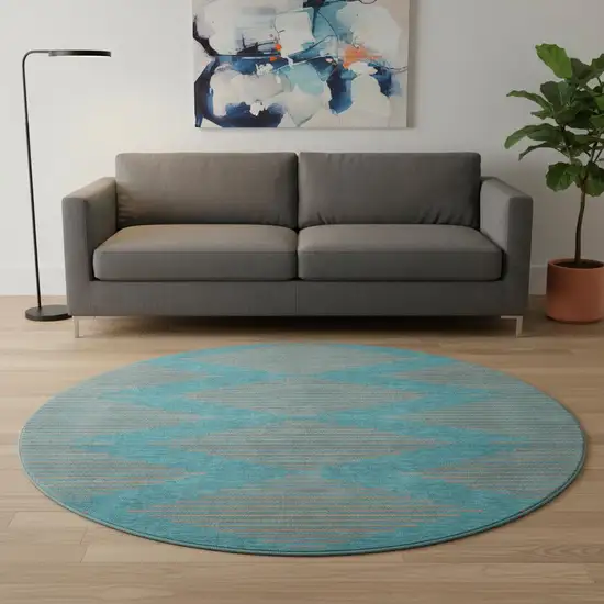 8' Teal And Peach Geometric Washable Round Rug With UV Protection Photo 2