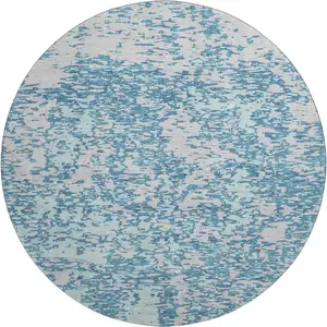 Photo of 8' Teal And Silver Abstract Washable Round Rug With UV Protection