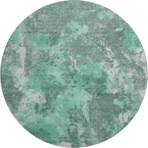 Photo of 8' Teal And Silver Abstract Washable Round Rug With UV Protection