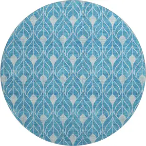 Photo of 8' Teal And Silver Geometric Washable Round Rug With UV Protection