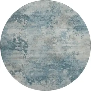 Photo of 8' Teal And Taupe Abstract Washable Round Rug With UV Protection